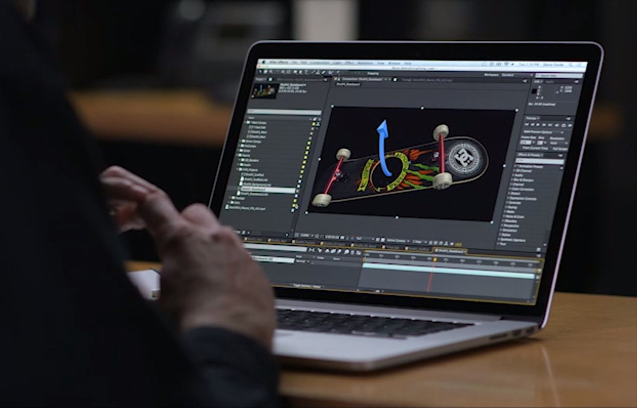 Personne utilisant un logiciel de modélisation 3D sur un ordinateur portable pour animer un skateboard coloré.